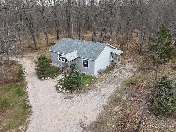 8.15 Acres of Land with Home for Sale in Wellston, Michigan