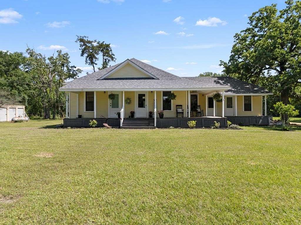 29.4 Acres of Recreational Land with Home for Sale in Palestine, Texas