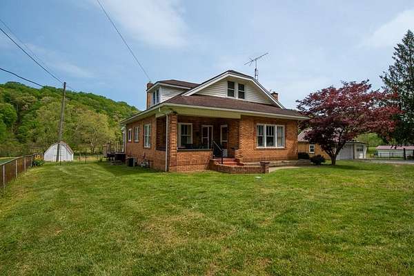 13.3 Acres of Land with Home for Sale in Lucasville, Ohio
