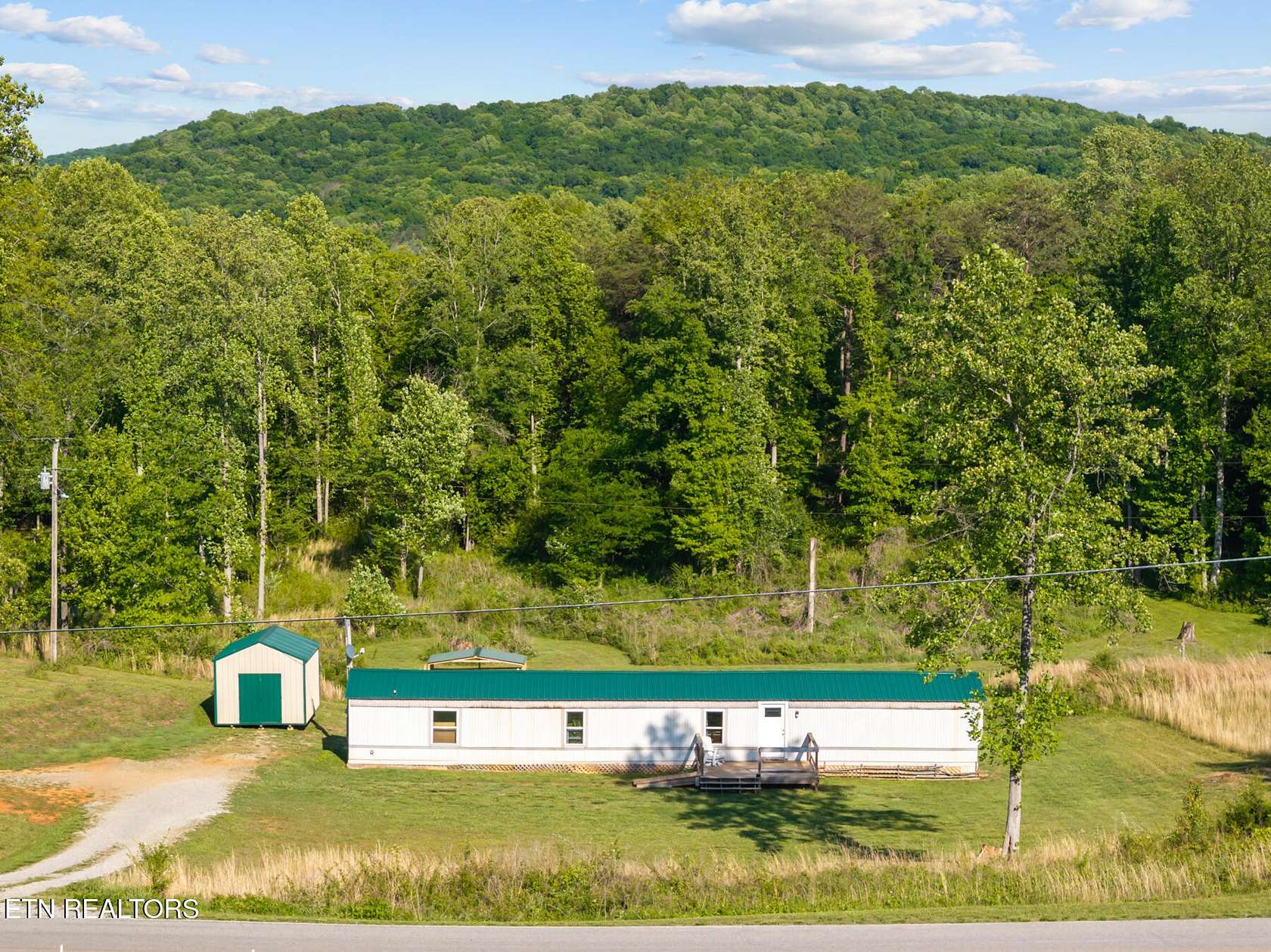5 Acres of Land with Home for Sale in Rock Island, Tennessee