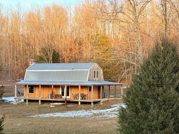 7 Acres of Land with Home for Sale in Vanzant, Missouri