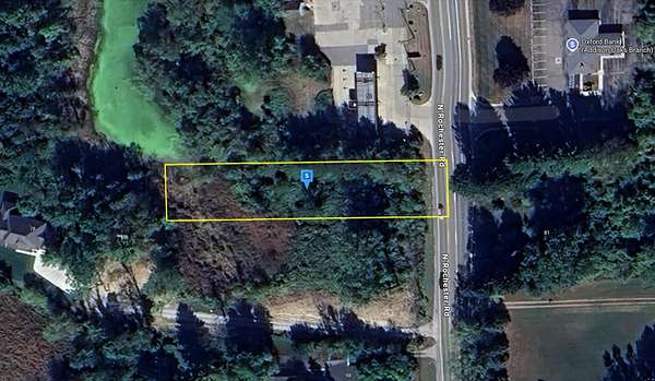 0.56 Acres of Commercial Land for Sale in Oakland Charter Township, Michigan