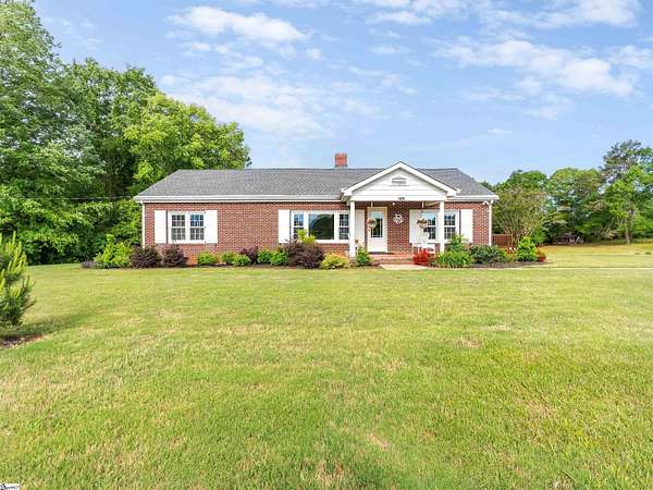 1.5 Acres of Land with Home for Sale in Campobello, South Carolina