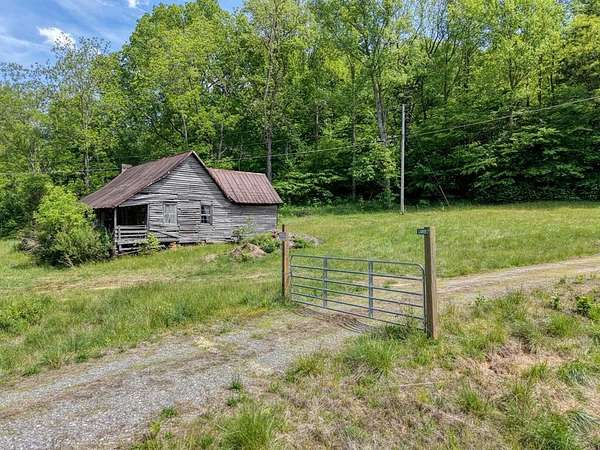 16.9 Acres of Land with Home for Sale in Hiawassee, Georgia