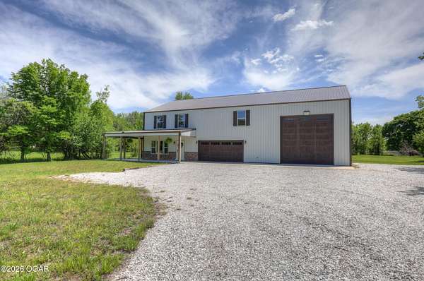 7 Acres of Land with Home for Sale in Carl Junction, Missouri