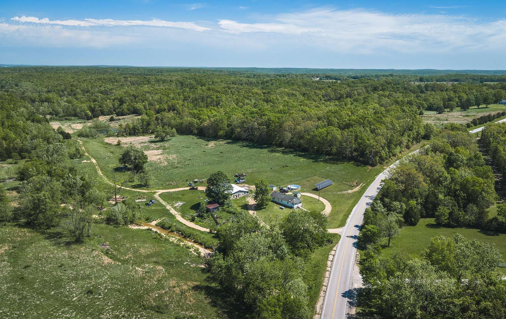 111 Acres of Land with Home for Sale in Boss, Missouri