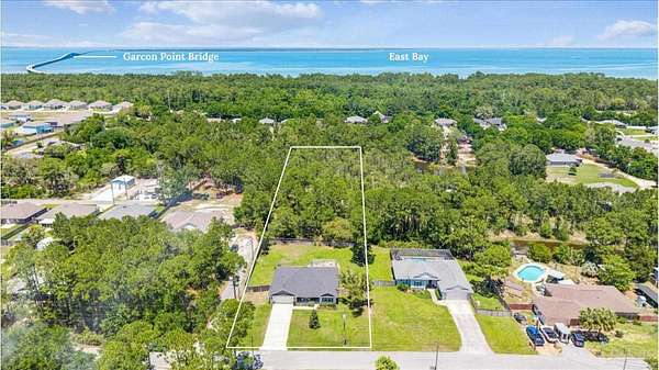 1.59 Acres of Land with Home for Sale in Gulf Breeze, Florida