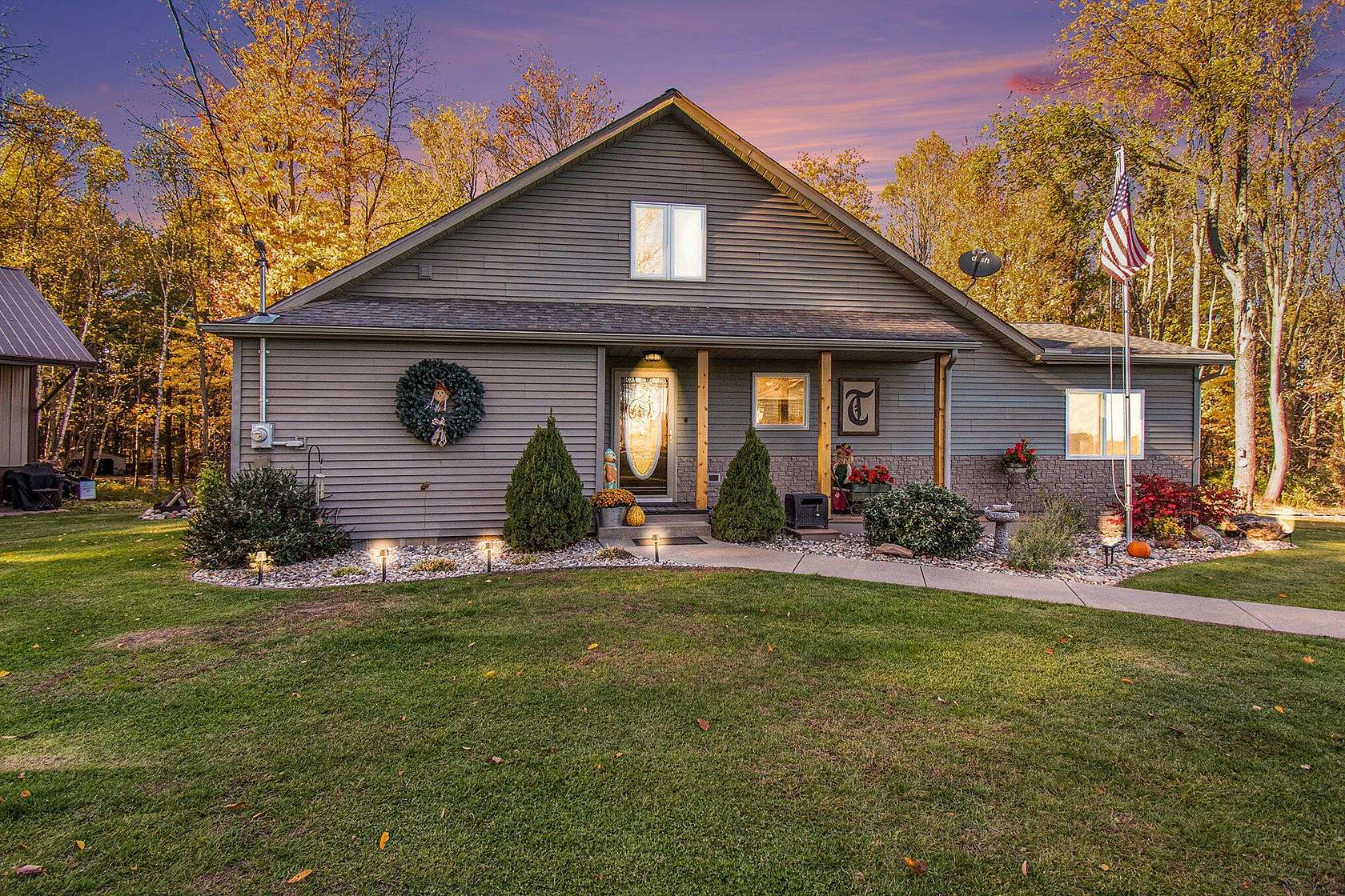 12.8 Acres of Recreational Land with Home for Sale in Stanton, Michigan