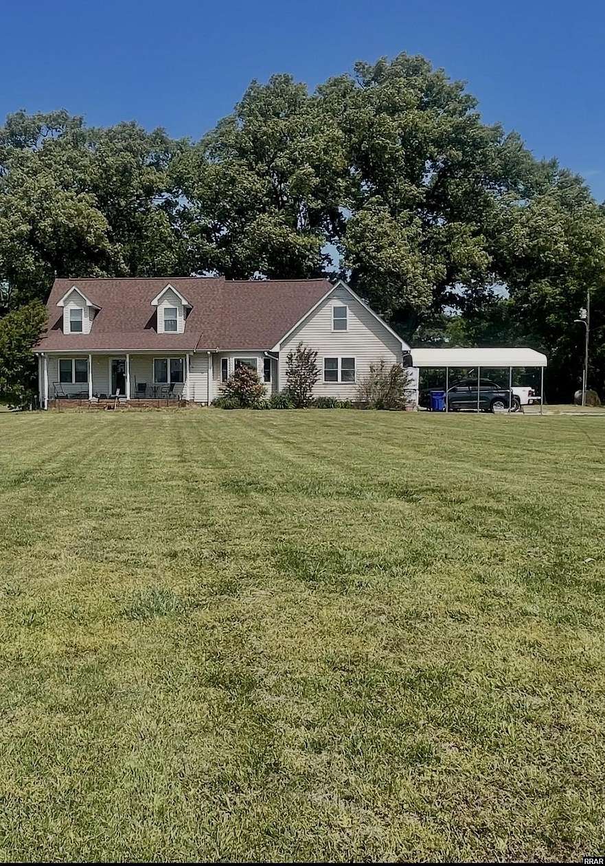 5.3 Acres of Land with Home for Sale in Martin, Tennessee