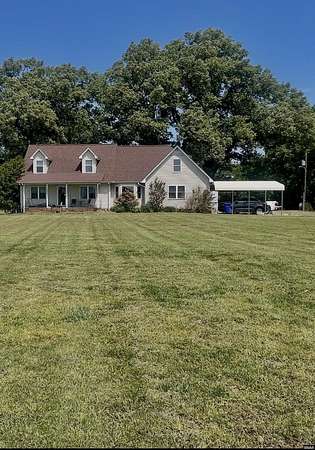 5.3 Acres of Land with Home for Sale in Martin, Tennessee
