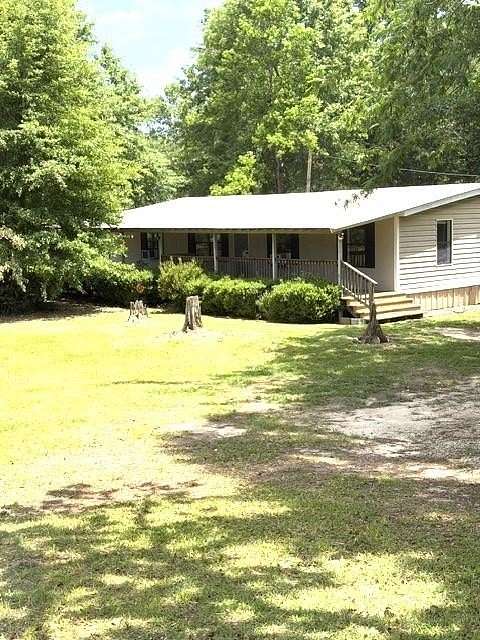1.79 Acres of Land with Home for Sale in Carriere, Mississippi