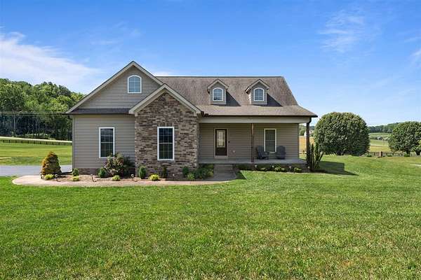 1.57 Acres of Land with Home for Sale in Scottsville, Kentucky