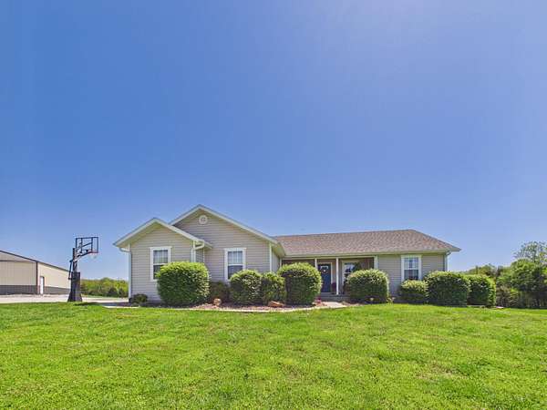 6 Acres of Land with Home for Sale in Buffalo, Missouri