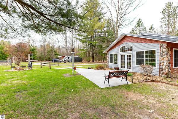 4.87 Acres of Land with Home for Sale in Interlochen, Michigan