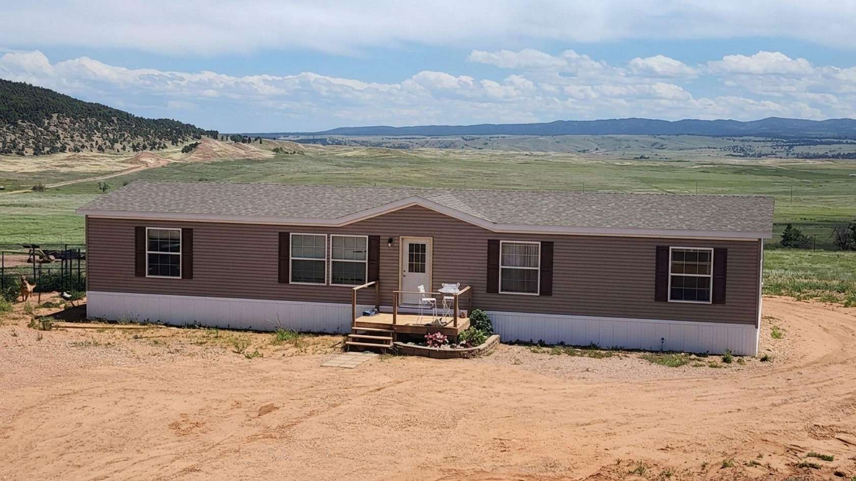 5 Acres of Land with Home for Sale in Sundance, Wyoming