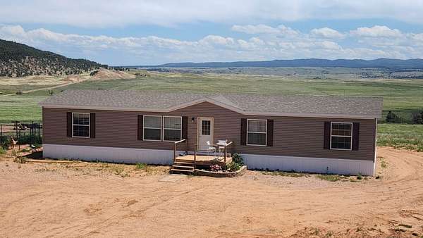 5 Acres of Land with Home for Sale in Sundance, Wyoming