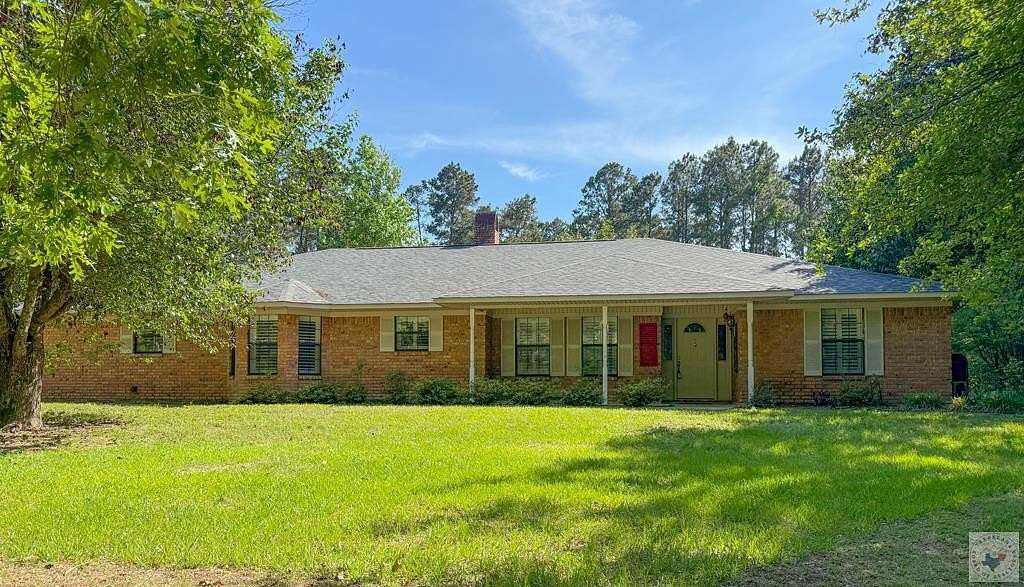 14.2 Acres of Land with Home for Sale in Atlanta, Texas