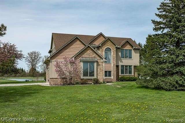 5 Acres of Land with Home for Sale in Columbus Township, Michigan
