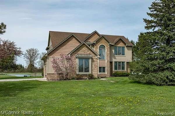 5 Acres of Land with Home for Sale in Columbus Township, Michigan