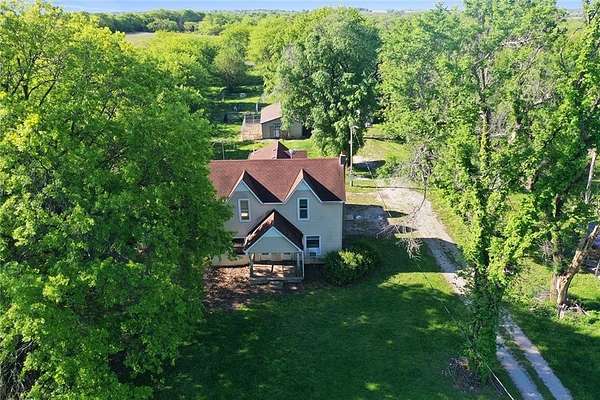 9.64 Acres of Land with Home for Sale in Hamilton, Missouri