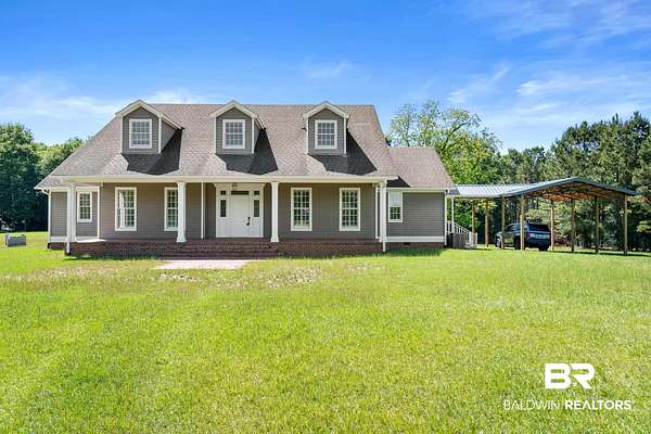 5.69 Acres of Land with Home for Sale in Summerdale, Alabama