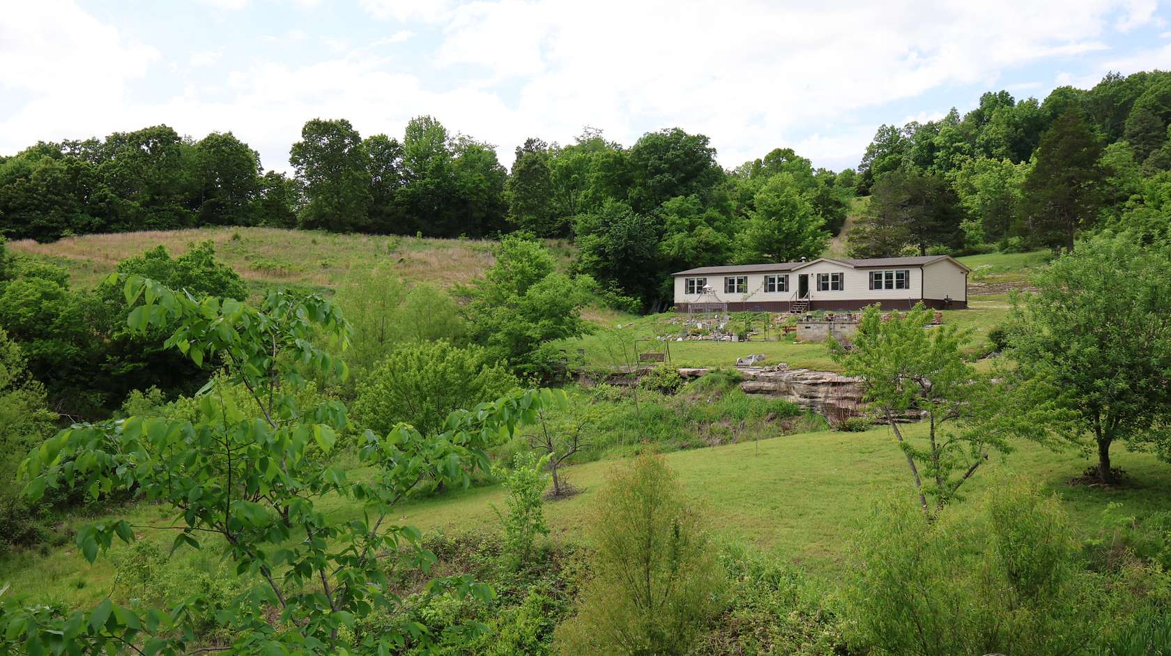 164 Acres of Recreational Land with Home for Sale in Melbourne, Arkansas
