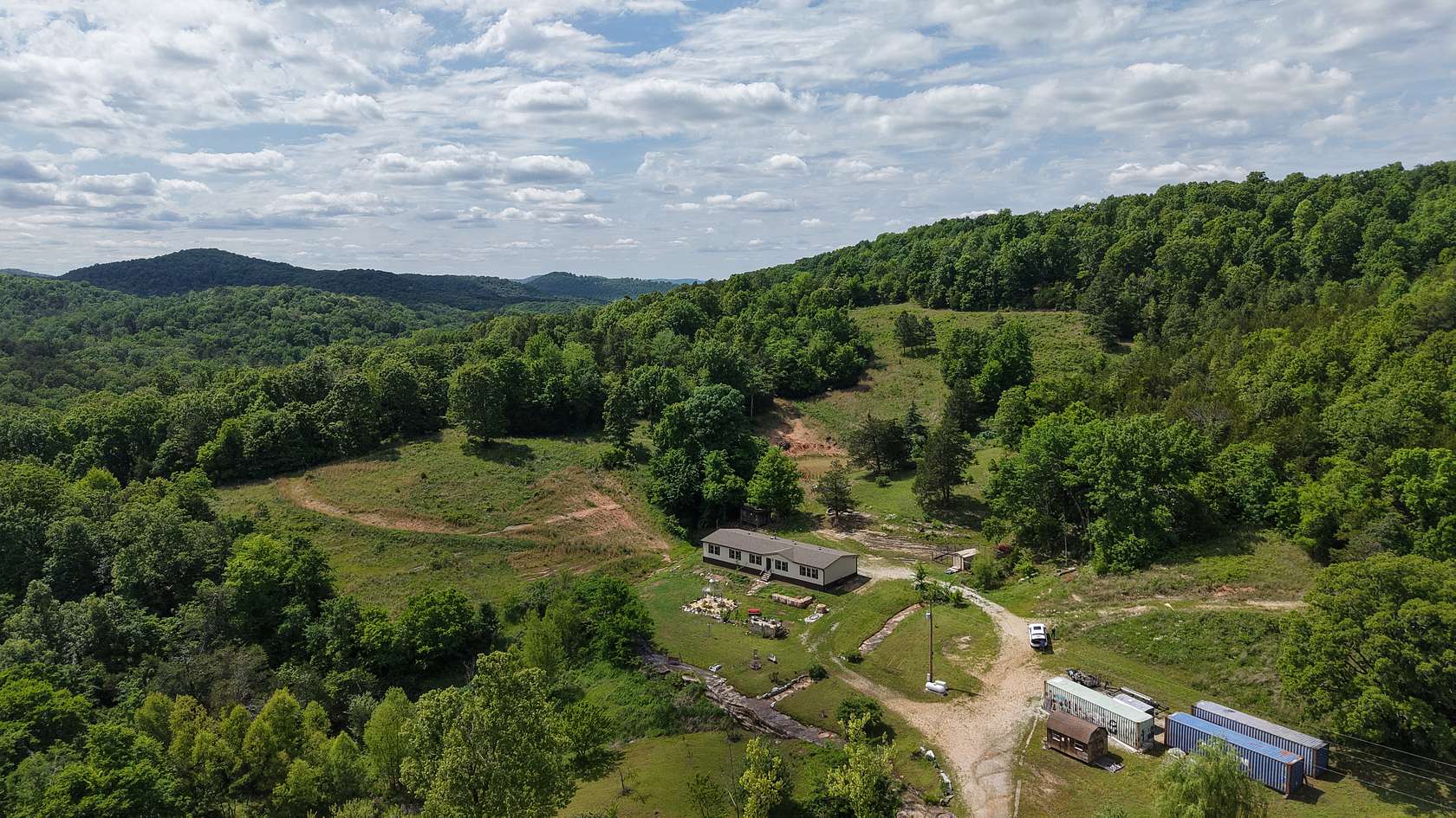 164 Acres of Recreational Land with Home for Sale in Melbourne, Arkansas