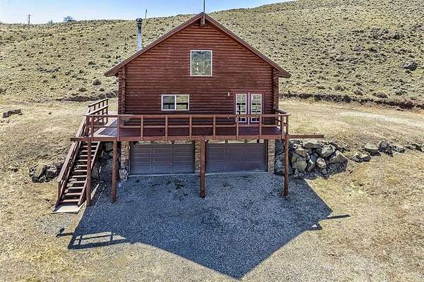 8.77 Acres of Land with Home for Sale in Cody, Wyoming
