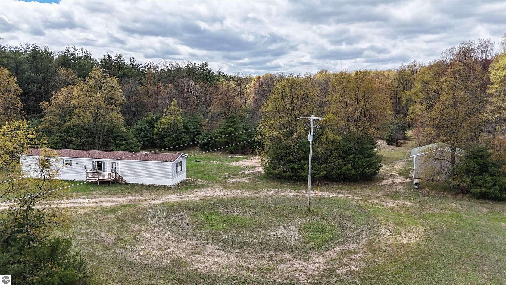11.7 Acres of Land with Home for Sale in McBain, Michigan