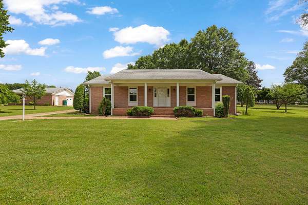 1.58 Acres of Land with Home for Sale in Huntingdon, Tennessee