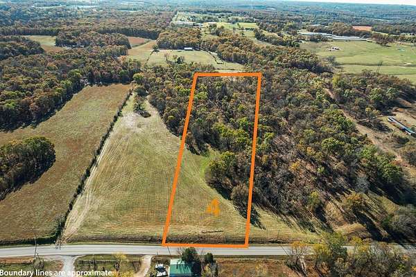 9 Acres of Residential Land for Sale in Gravette, Arkansas