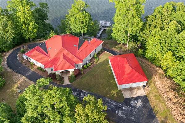 2.77 Acres of Land with Home for Sale in Big Sandy, Tennessee