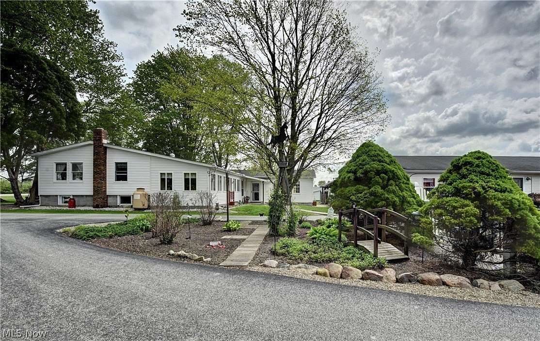 10.3 Acres of Land with Home for Auction in North Bloomfield, Ohio