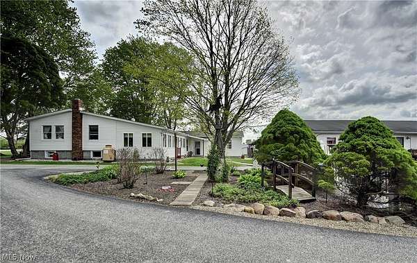 10.3 Acres of Land with Home for Auction in North Bloomfield, Ohio