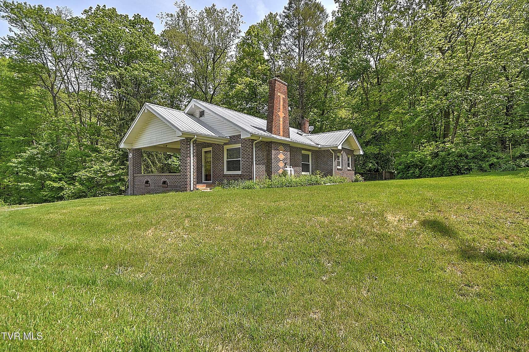 61.6 Acres of Recreational Land with Home for Sale in Roan Mountain, Tennessee