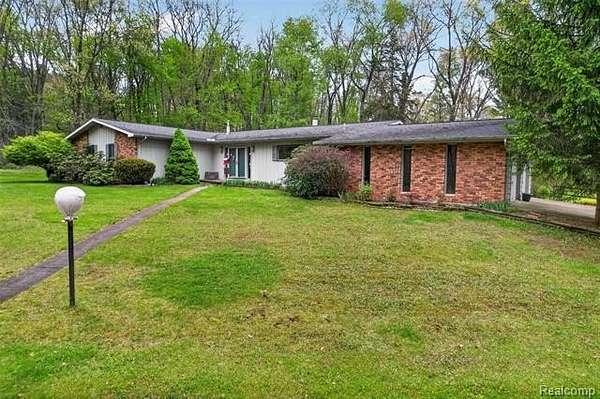 2.26 Acres of Land with Home for Sale in Hamburg Township, Michigan