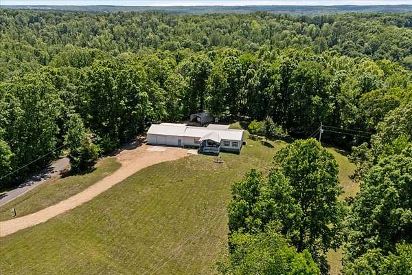 18.1 Acres of Land with Home for Sale in Erin, Tennessee