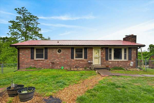 3 Acres of Land with Home for Sale in Woodlawn, Tennessee