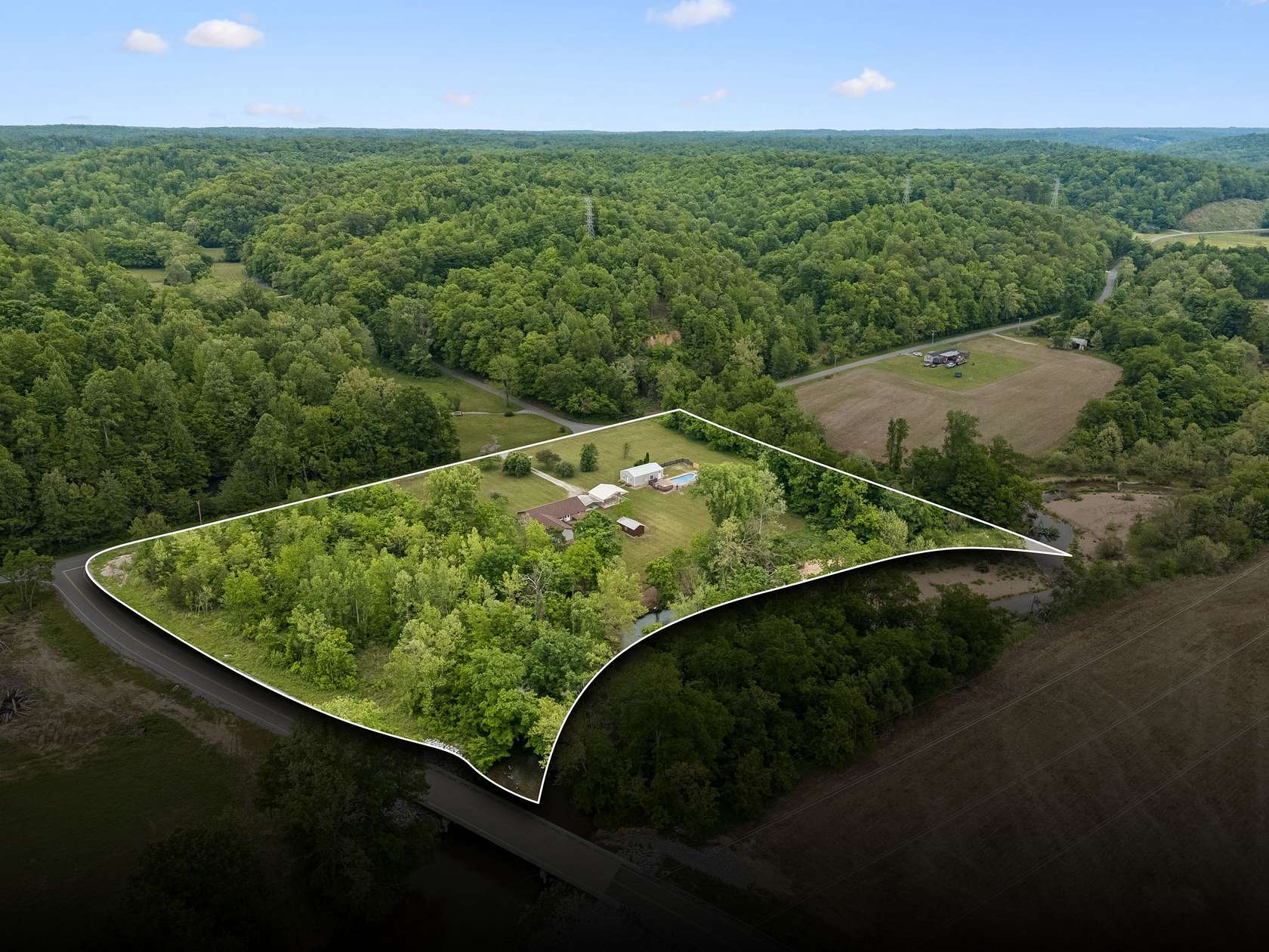 7.27 Acres of Land with Home for Sale in Waverly, Tennessee