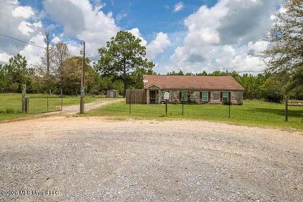 8.6 Acres of Land with Home for Sale in Saucier, Mississippi