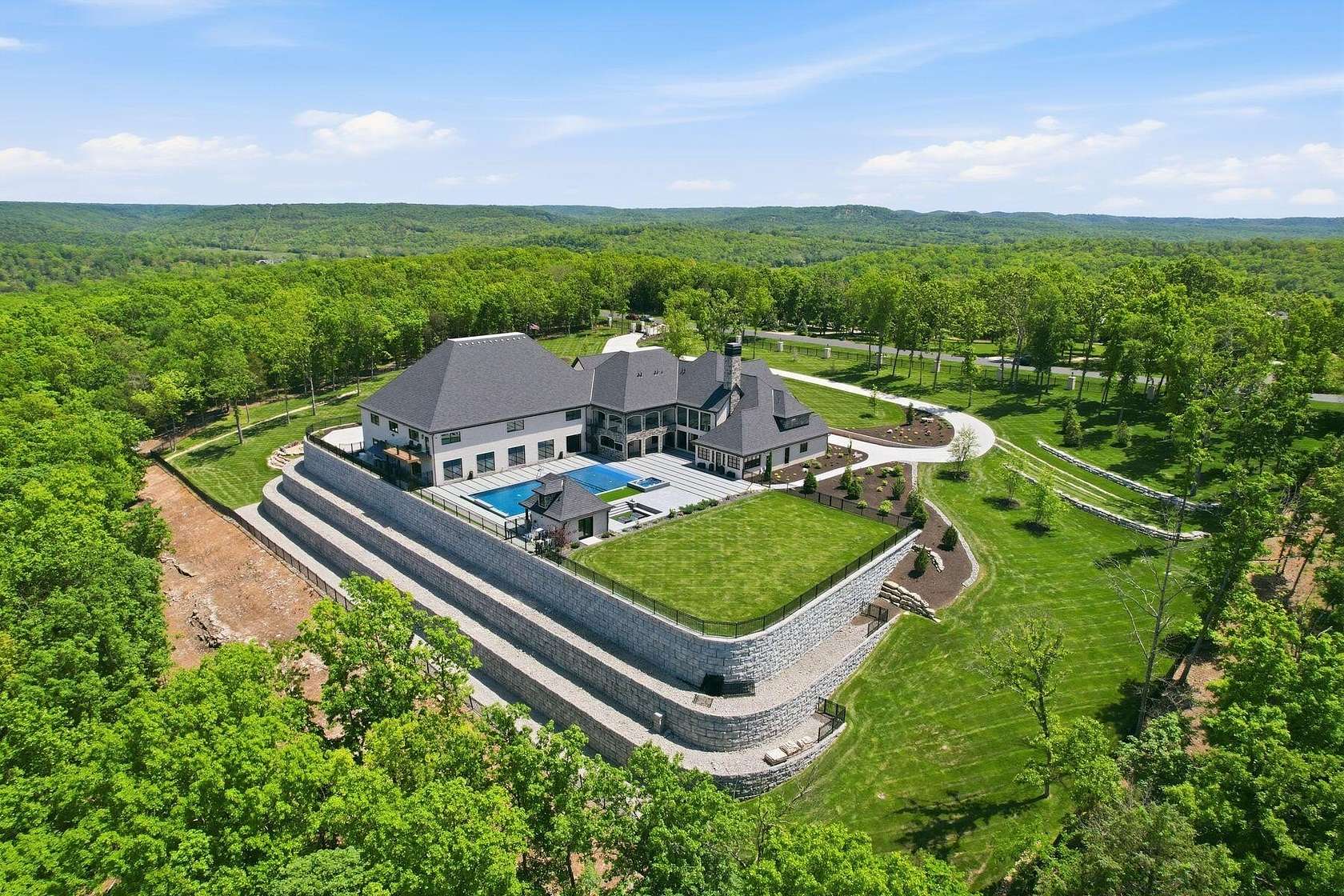 10.7 Acres of Recreational Land with Home for Sale in Saddlebrooke, Missouri