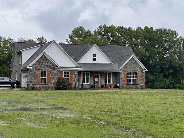 5 Acres of Land with Home for Sale in Covington, Tennessee