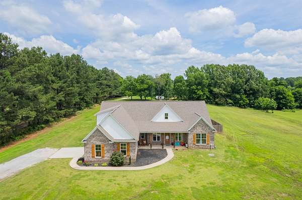 5 Acres of Land with Home for Sale in Covington, Tennessee