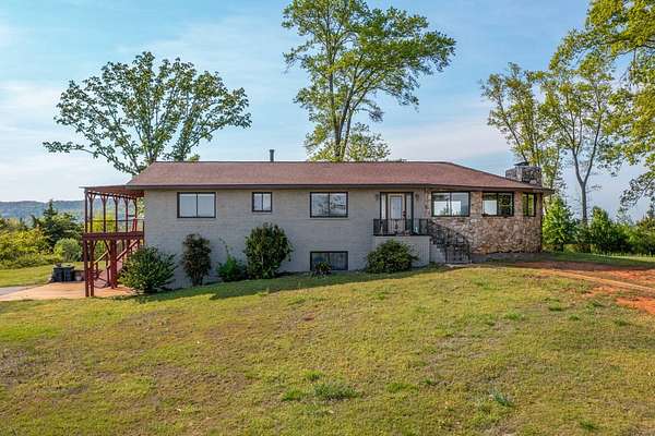 31 Acres of Recreational Land with Home for Auction in Anniston, Alabama