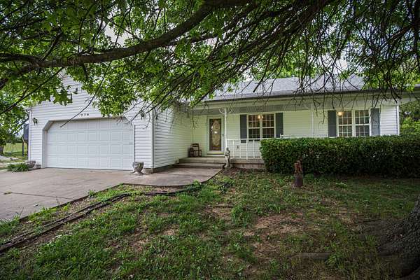 41.2 Acres of Land with Home for Sale in Lamar, Missouri