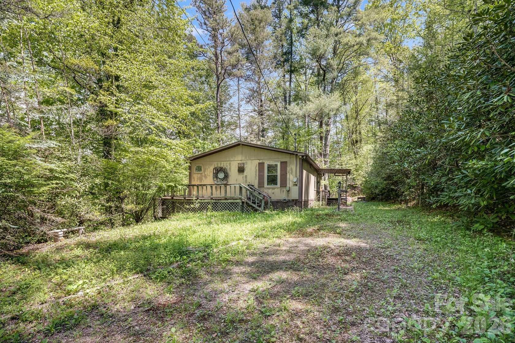 1.58 Acres of Land with Home for Sale in Clyde, North Carolina