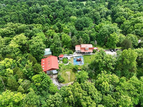 49 Acres of Land with Home for Sale in Lawrenceburg, Kentucky