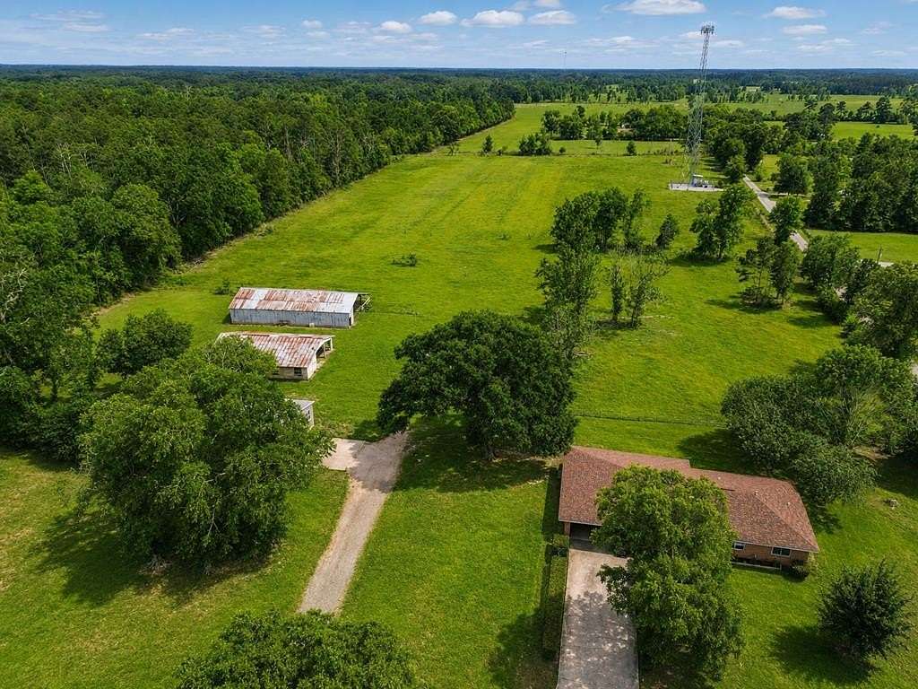 13.9 Acres of Land with Home for Sale in Kirbyville, Texas