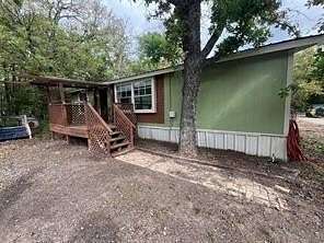 5 Acres of Land with Home for Sale in Quinlan, Texas