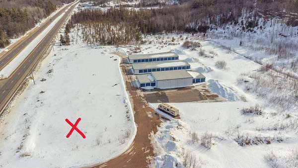 0.9 Acres of Commercial Land for Sale in Negaunee, Michigan